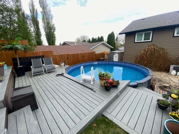 Above ground pool and deck